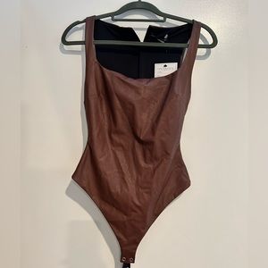 Naked wardrobe Brown Faux Leather Iconic Body suit!